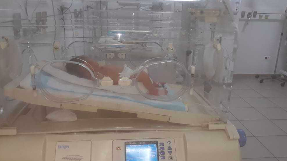 An infant in desperate need of undergoing urgent surgerys!