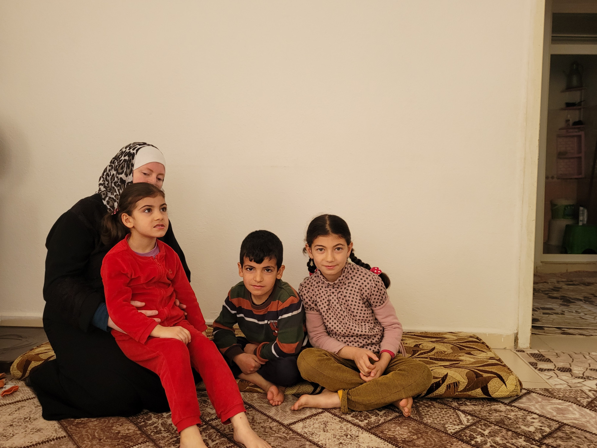 Aisha and her family can't stand for cold winter