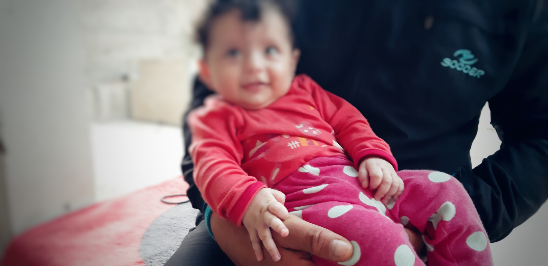 A family needs baby milk for their newborn twin