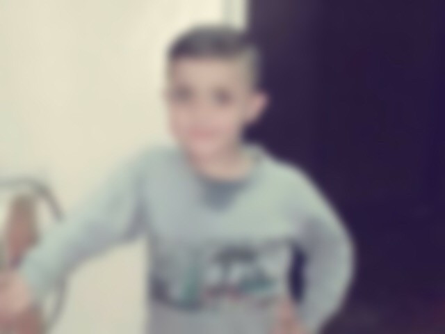 Child suffering from a muscular disease