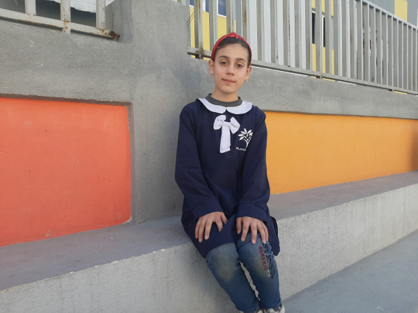 Tayma, an orphan girl in need of sponsorship.