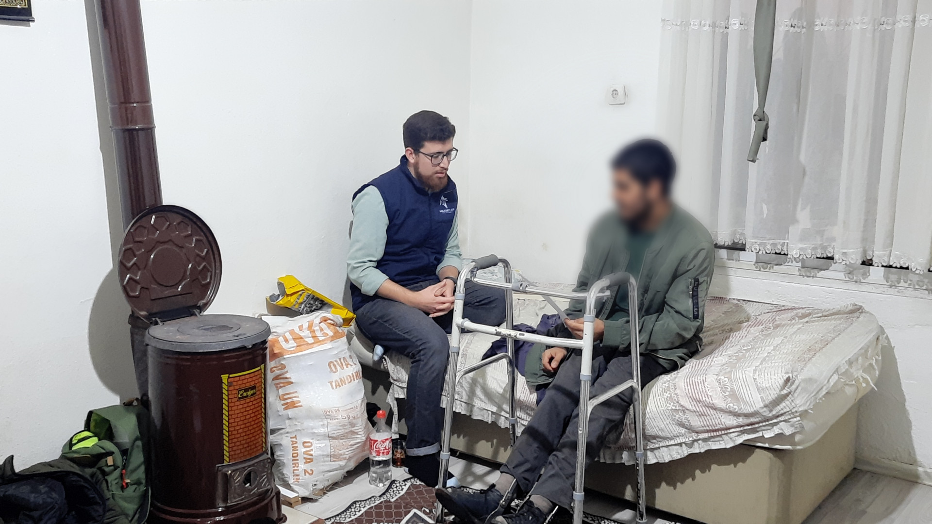 A young man with hemiplegia needs wheelchair.