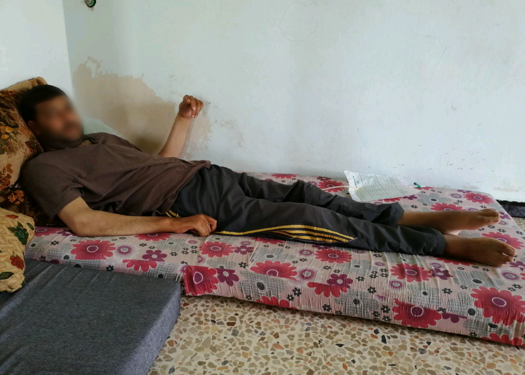 A young man suffers from quadriplegia