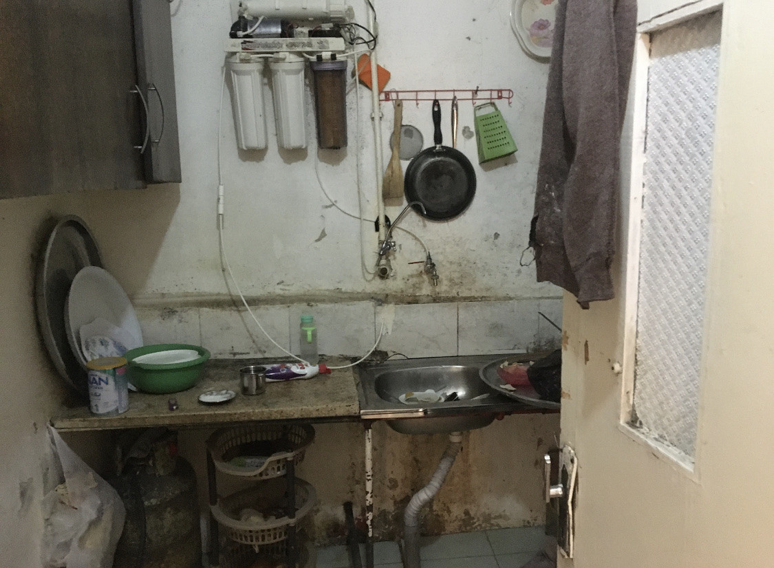A displaced family lives in an uninhabitable house
