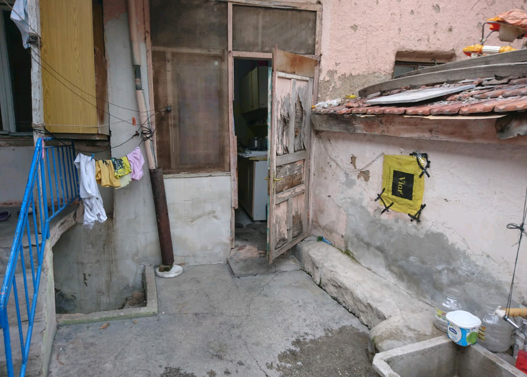 A family living in a miserable house