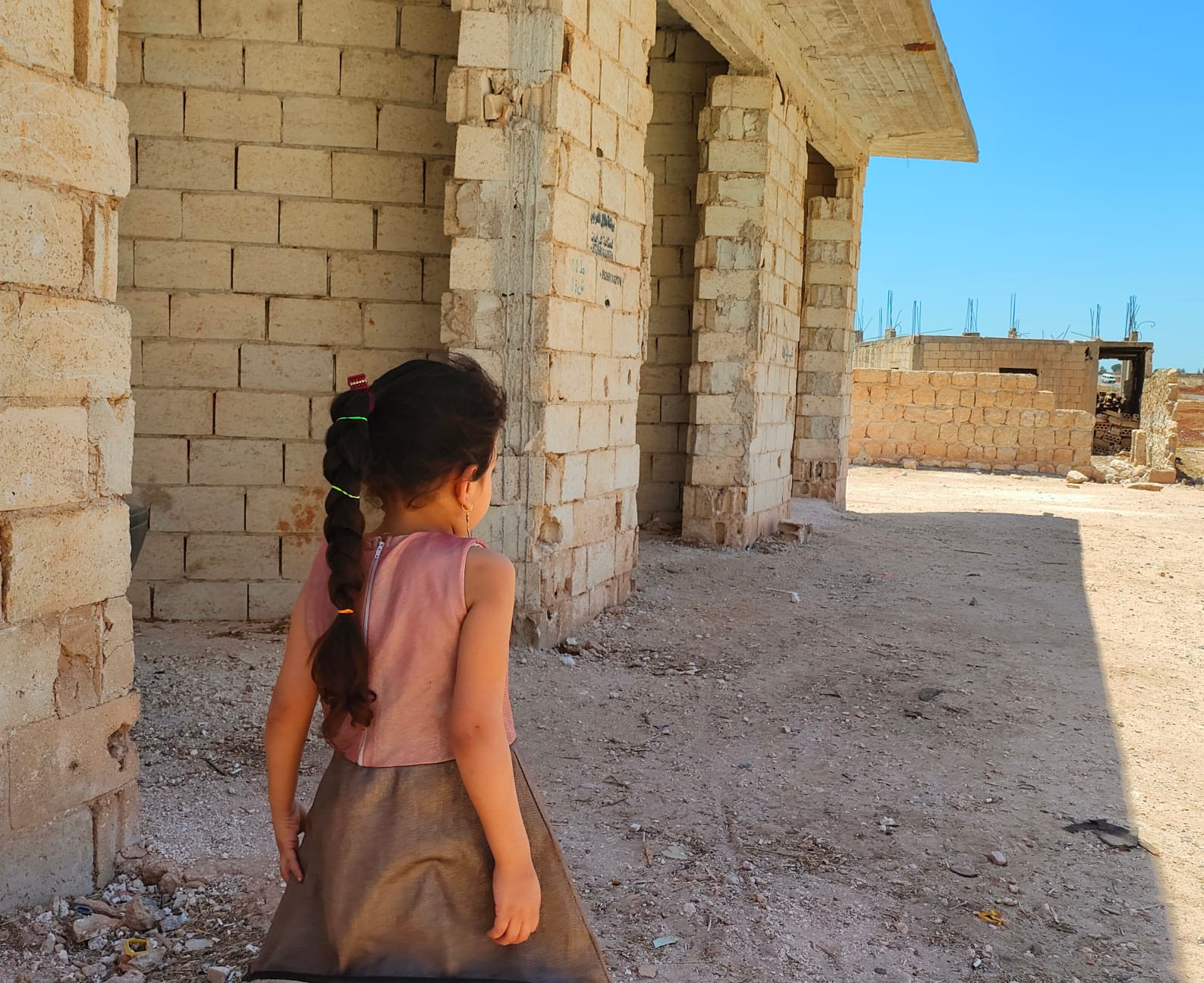 A glimmer of hope rising from the rubble.