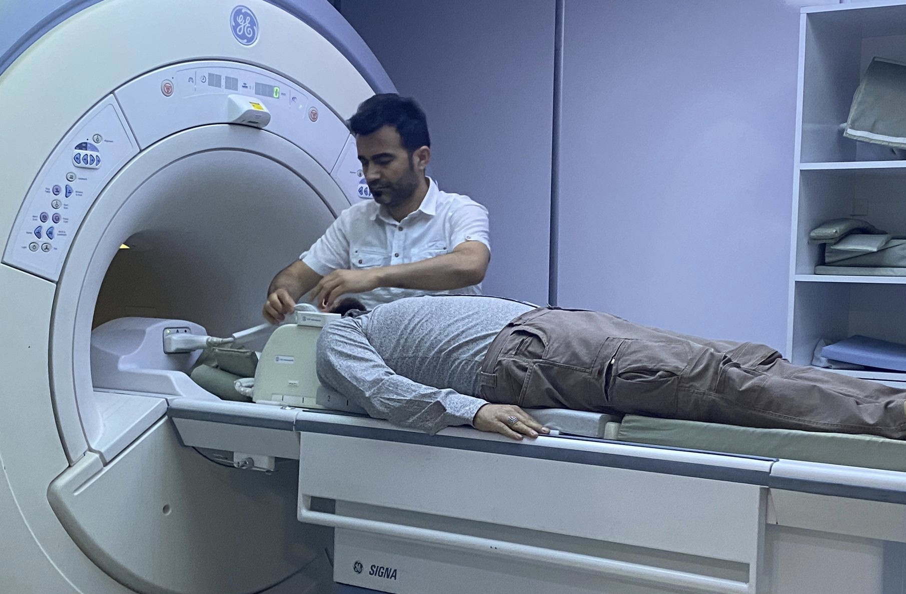 Haytham suffers from severe backache and needs urgent discectomy