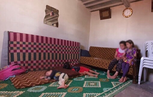 They were displaced from Ma'rret Alnouman to live in a house with no electricity