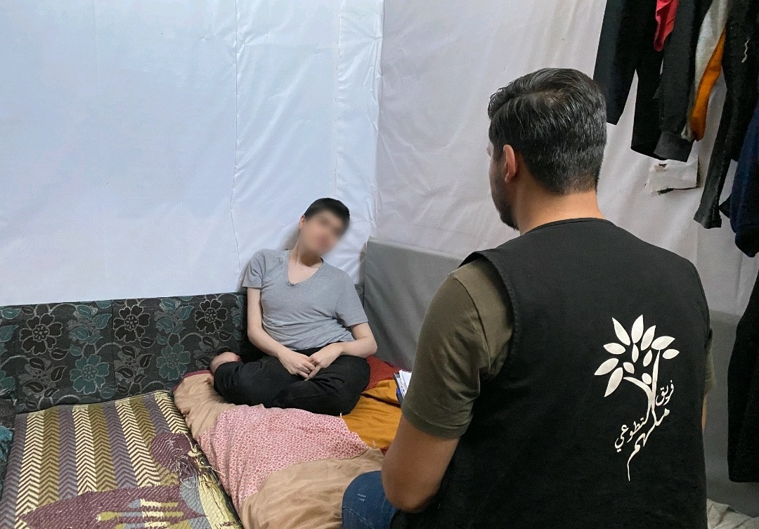 A family struggles to get by after surviving a long and perilous displacement