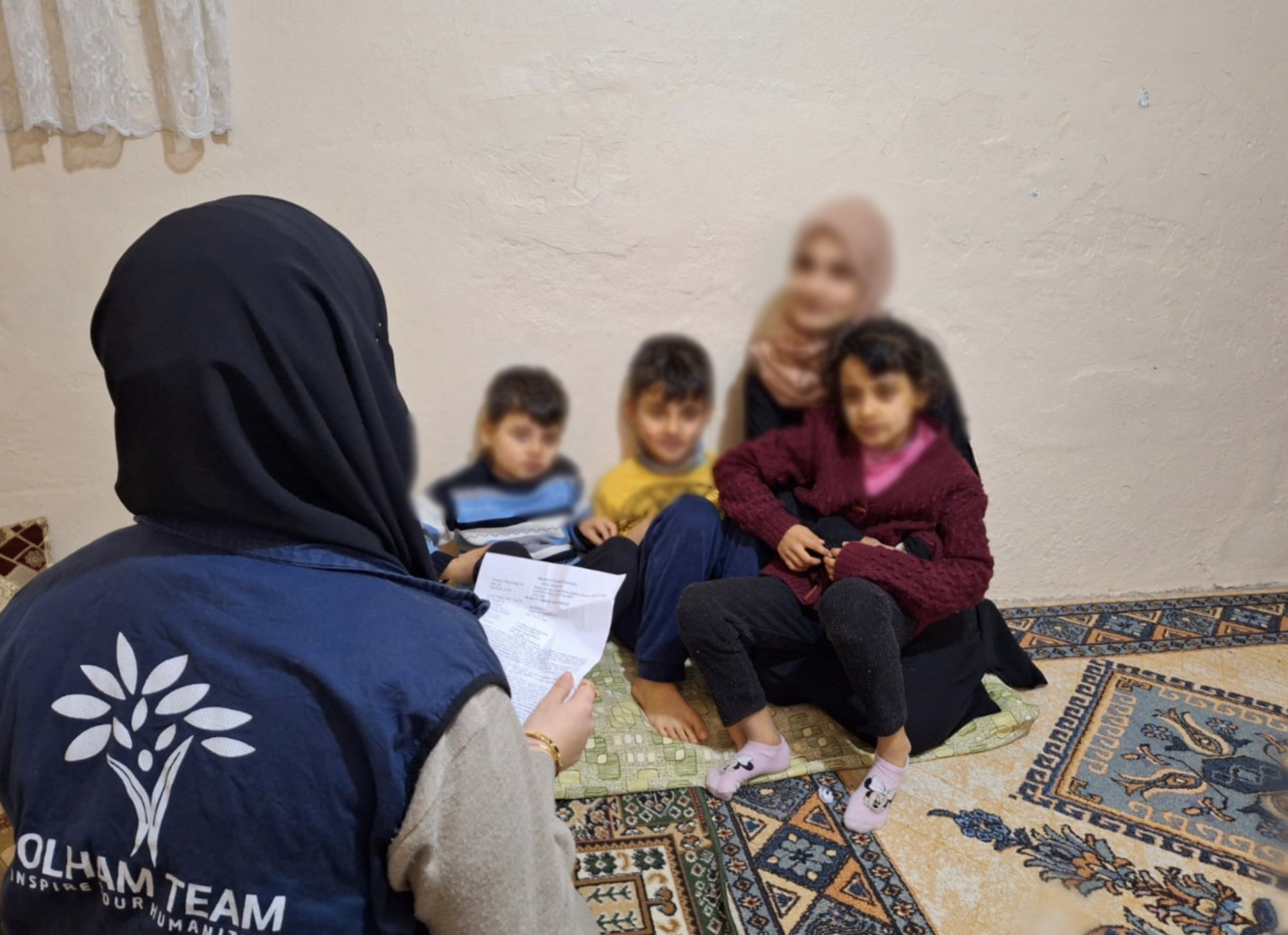 Khawla and her five children live in poverty and harsh conditions.