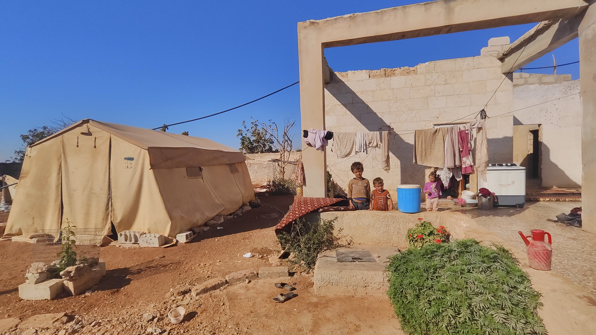 In a tent inside the walls