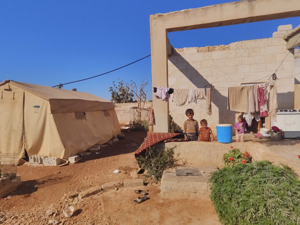 In a tent inside the walls