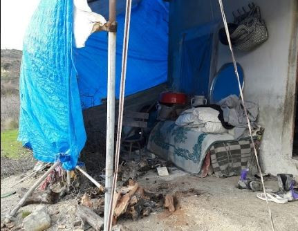 A family is living in a poor room