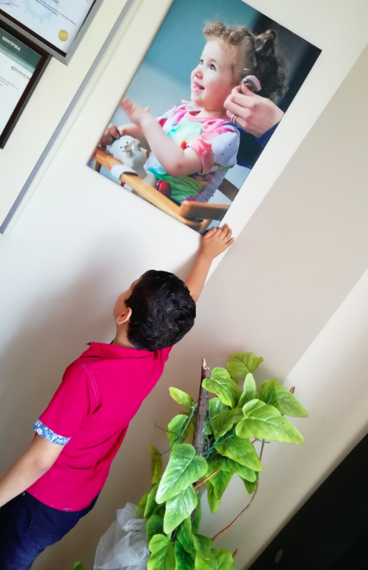 A child needs hearing aids