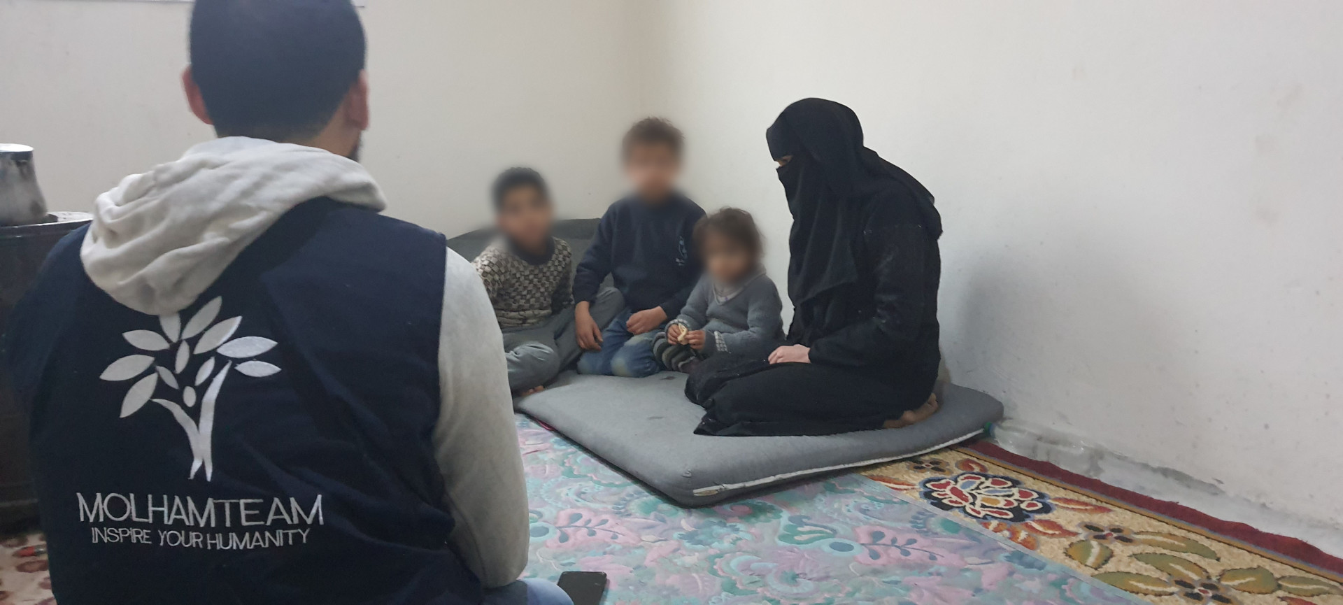 A woman and her children need your support