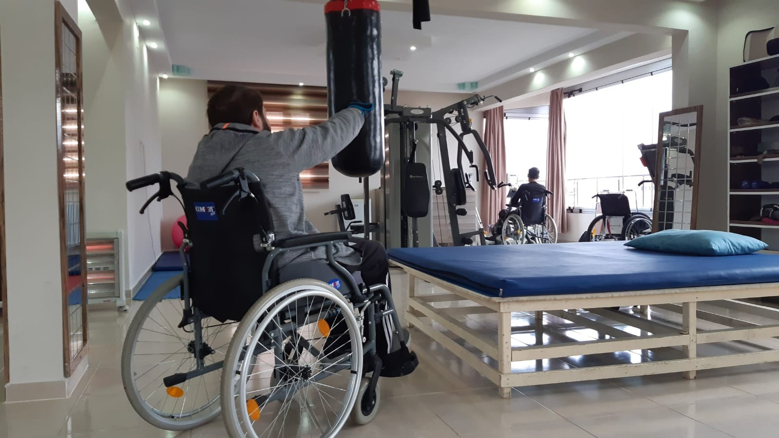 a paralyzed adult, needs supporter