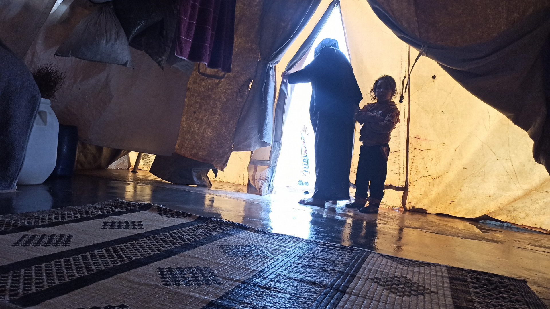 Mrs. Zahra waits for the return of her husband and son with a broken heart.