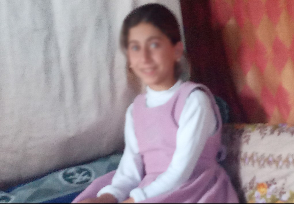 A little girl with growth impairments due to malnutrition
