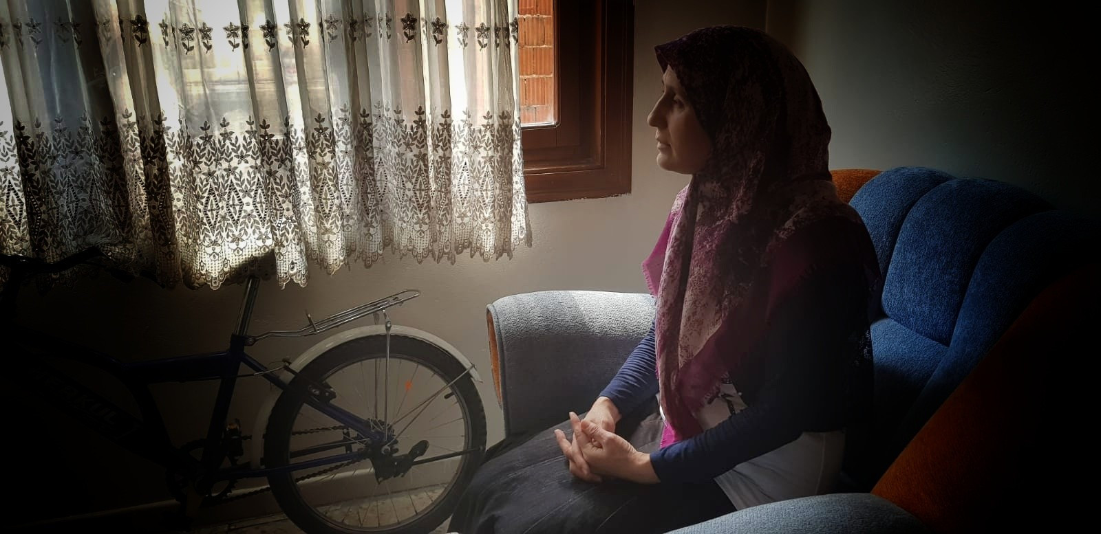 A woman suffers from hearing impairment