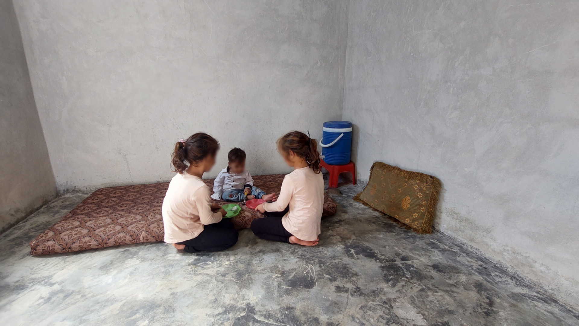 Fatima stands alone with her orphaned children