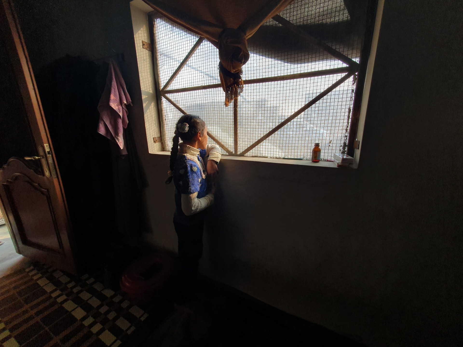 Mrs. Amina lives in harsh living conditions