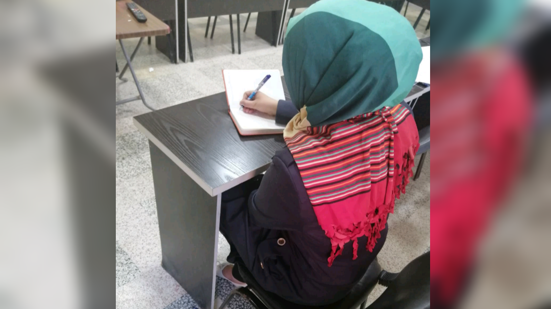 a young woman suffers from hearing impairment