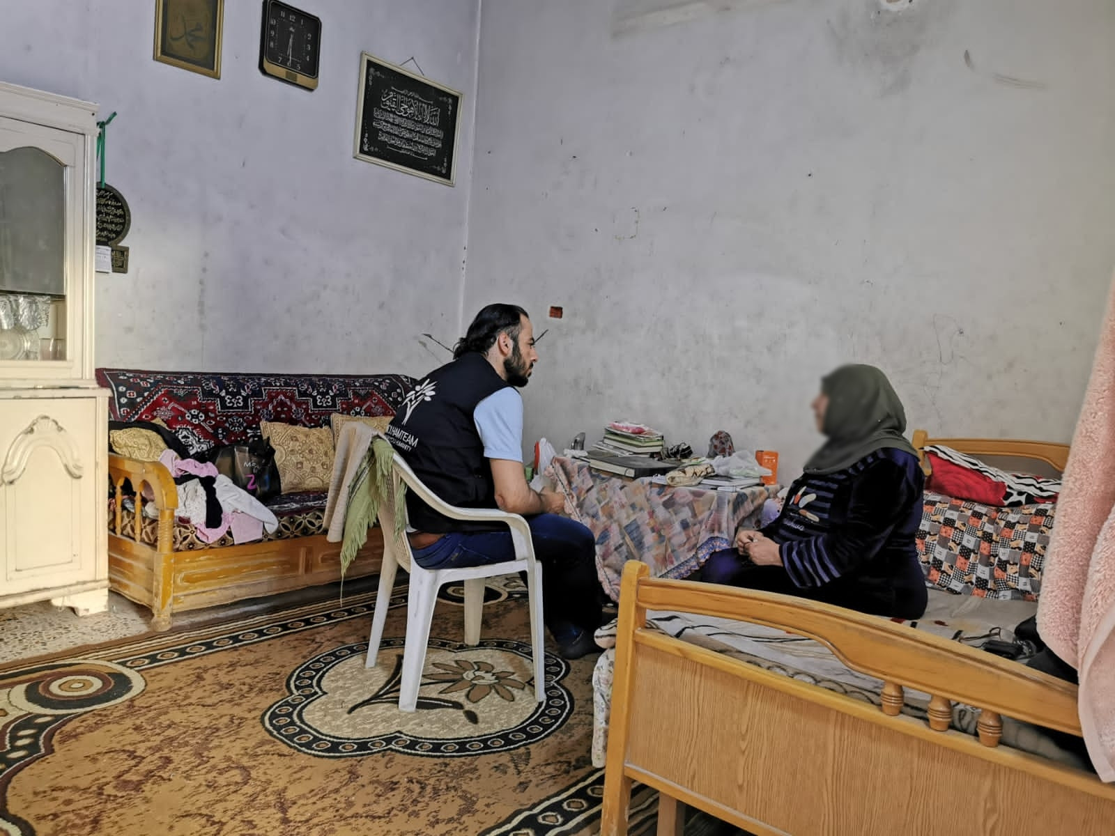 A 75-year-old woman that lives by herself