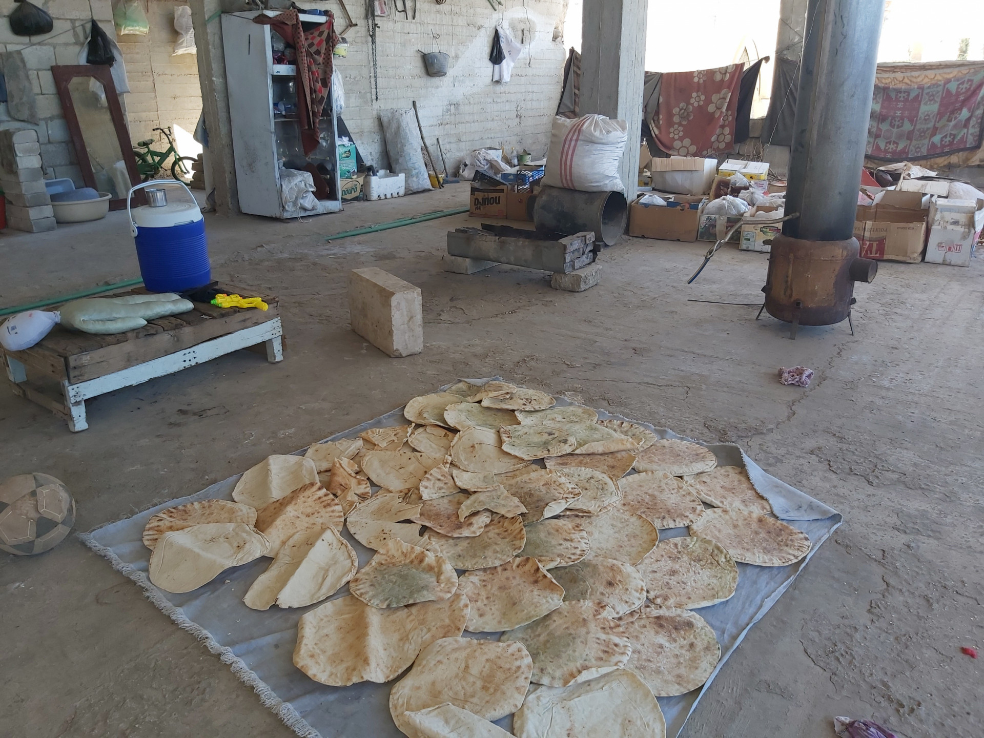A family struggles in miserable conditions