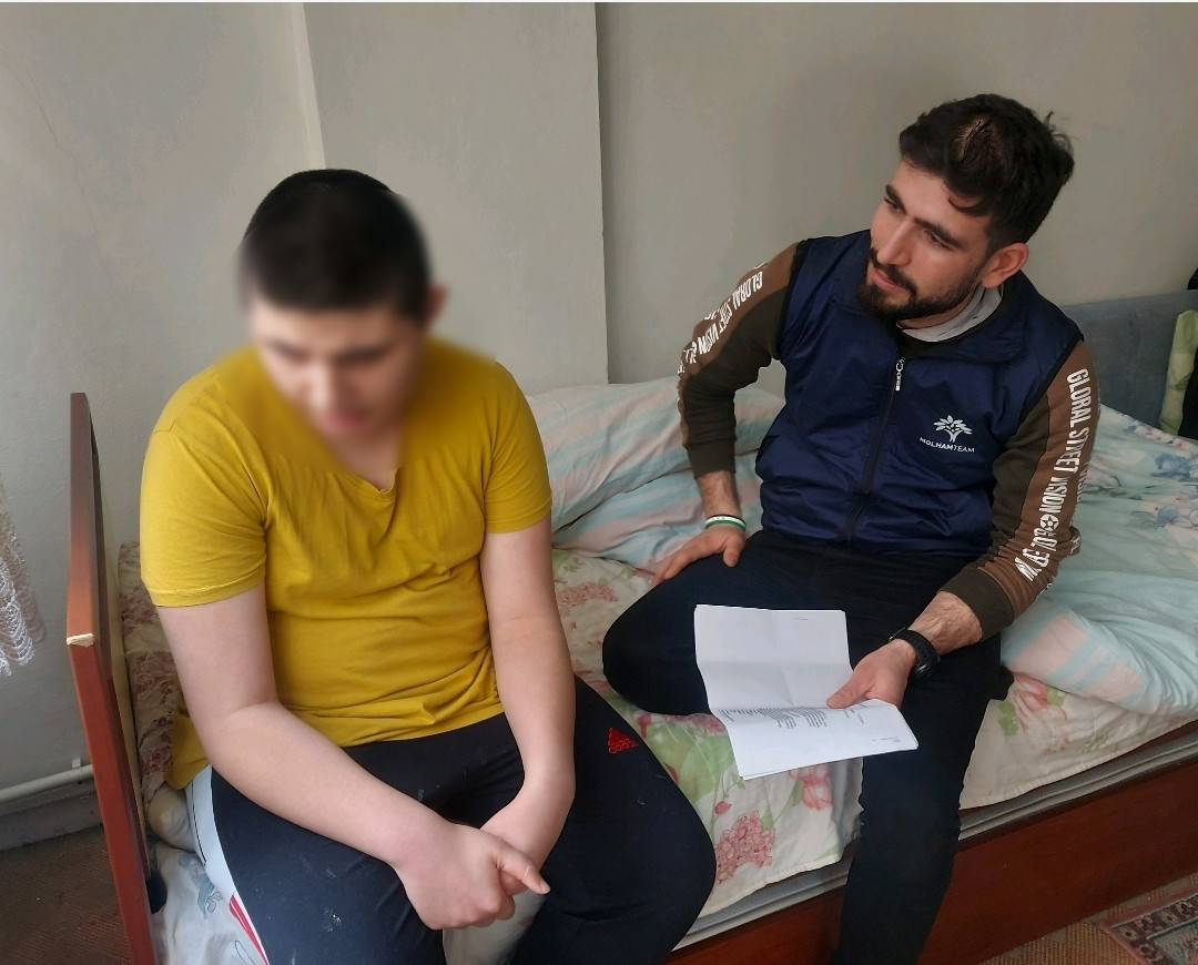 Mohamad, a thirteen-year-old orphan diagnosed with autism