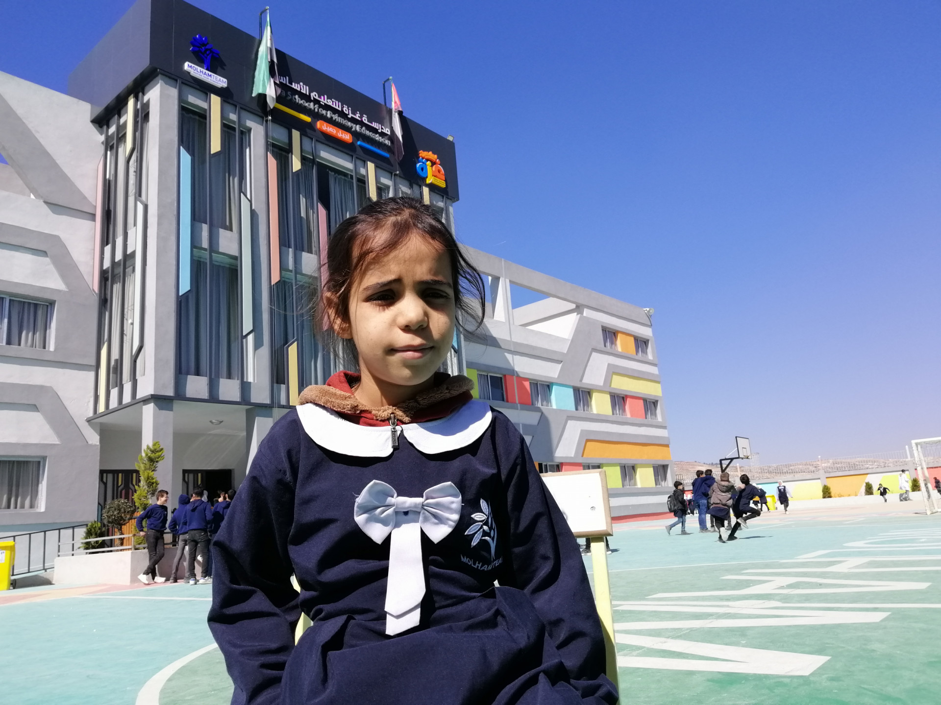 I am Hajar. I go to Gaza School, and I love it. I love my friends too.