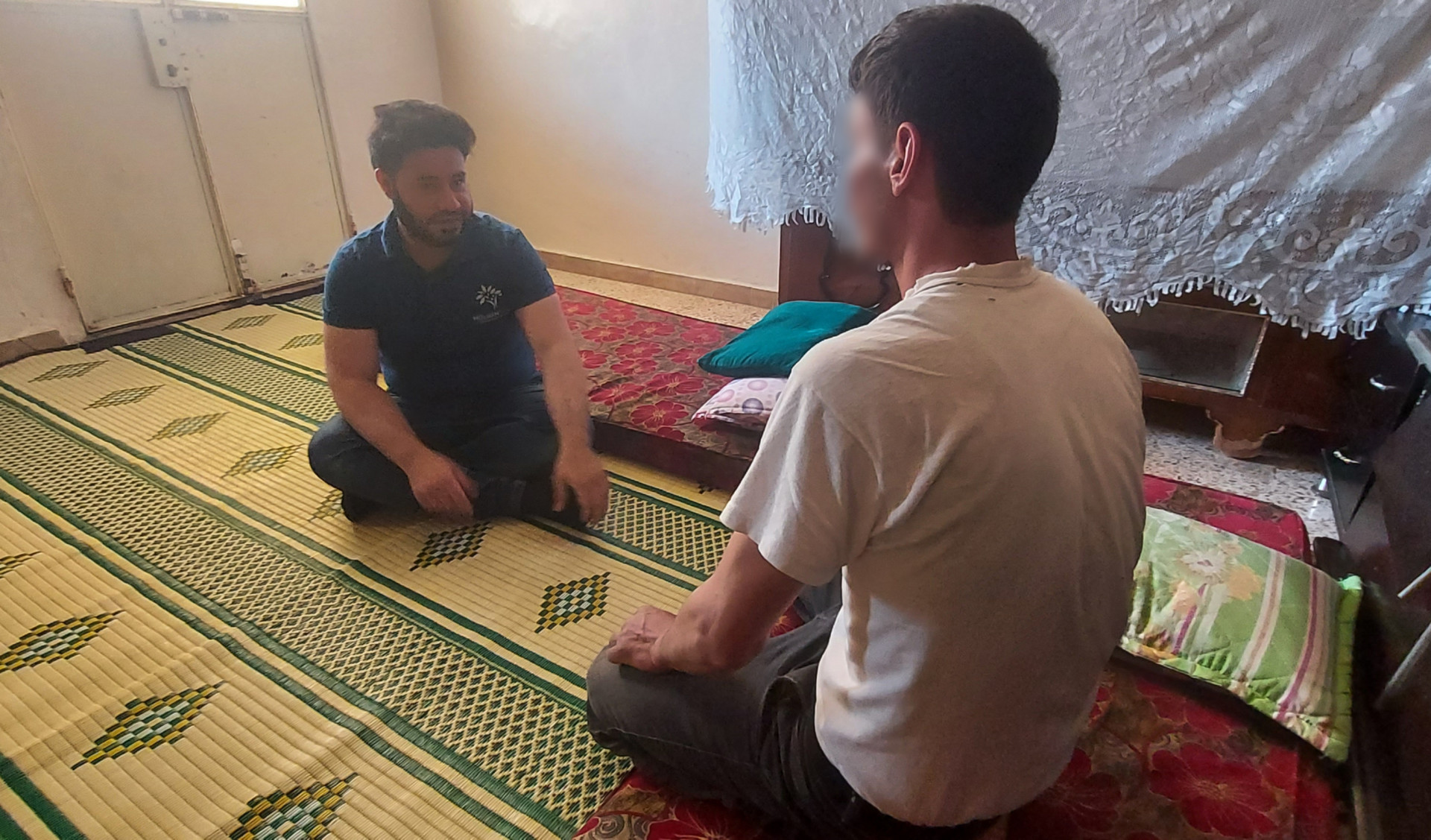 Ahmed's family shares a small house with his brother's family, under terrible living conditions