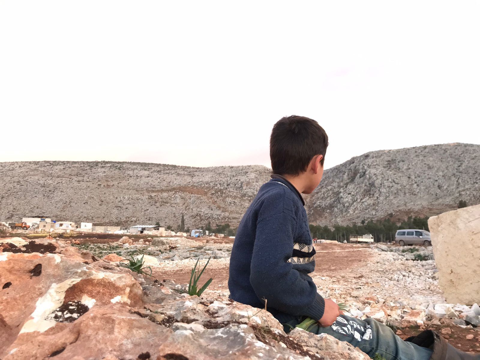 Qatada is a child from Aleppo