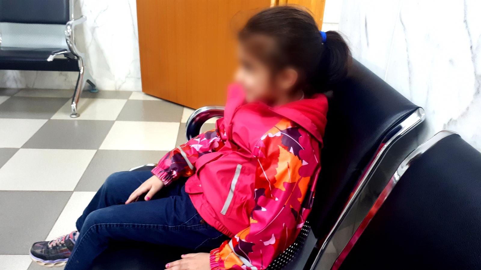 A little child needs tonsils surgery