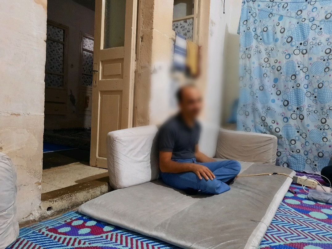 A young man with poliomyelitis, needs a wheelchair