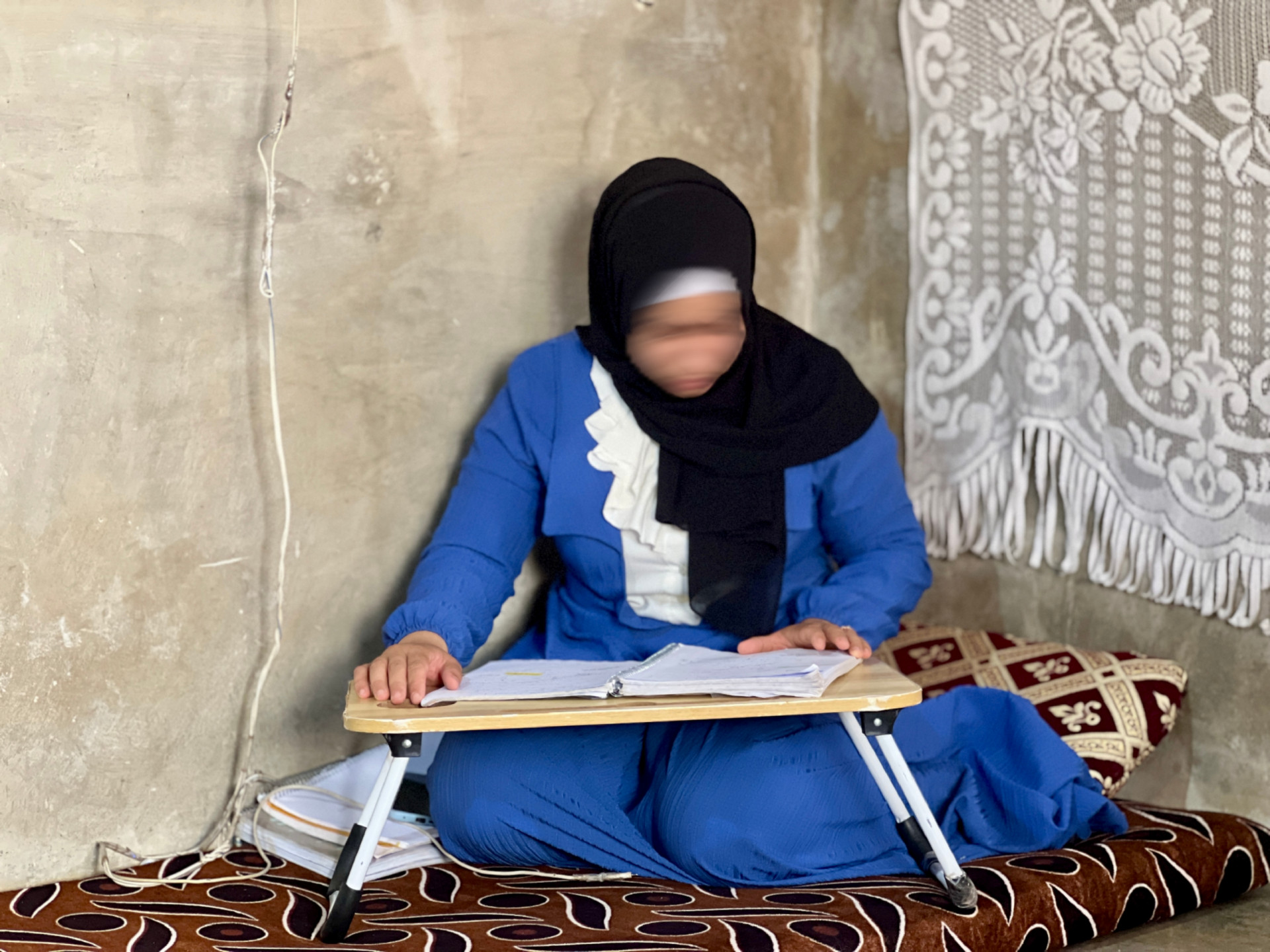 Manar is struggling to read and suffers from visual impairment!
