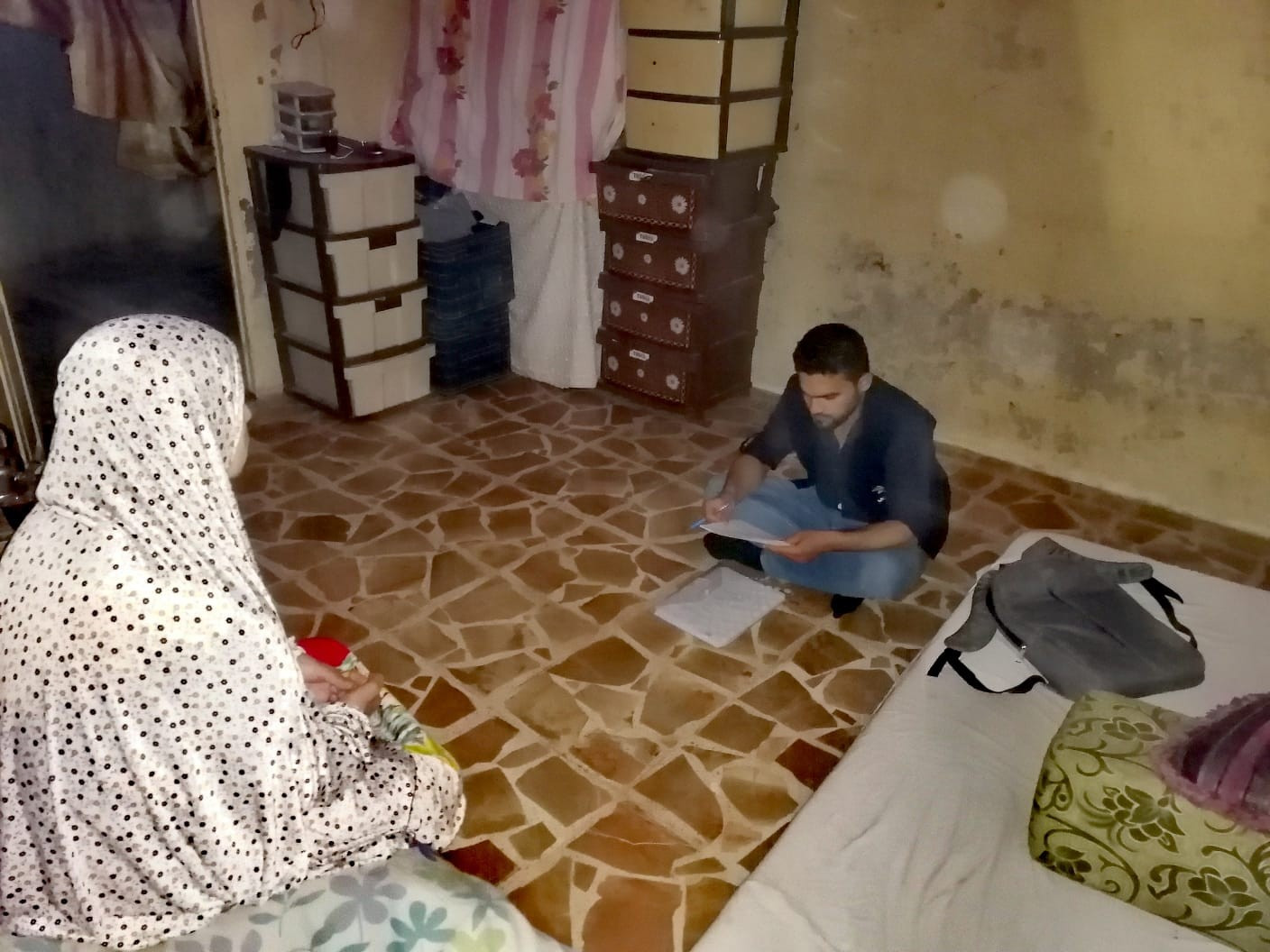 A woman with paralysis in need for help