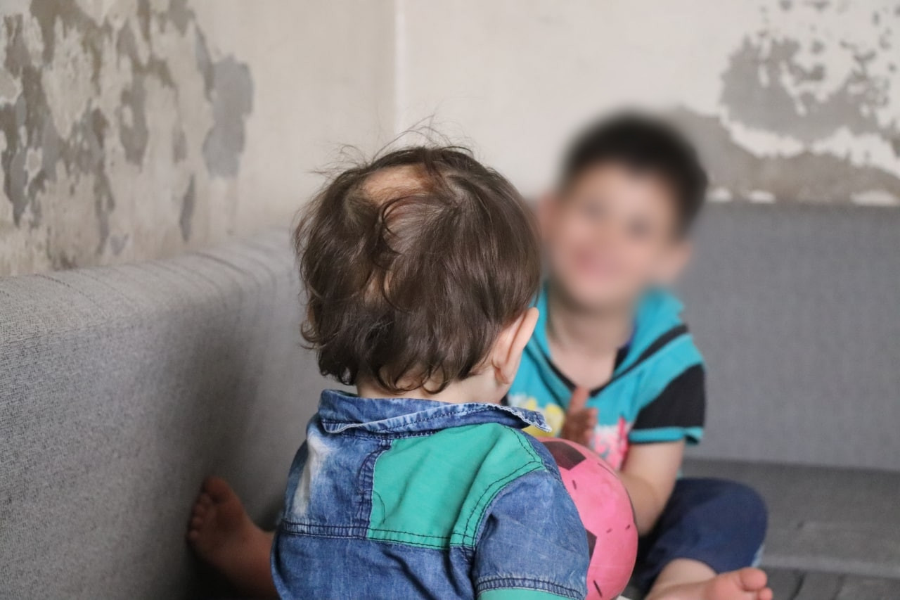Ala'a is partially disabled, his son is sick and his family seeks needs help