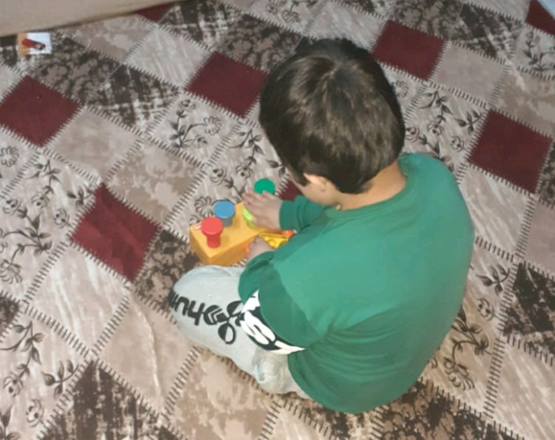 Mahmoud is an orphan with Down syndrome