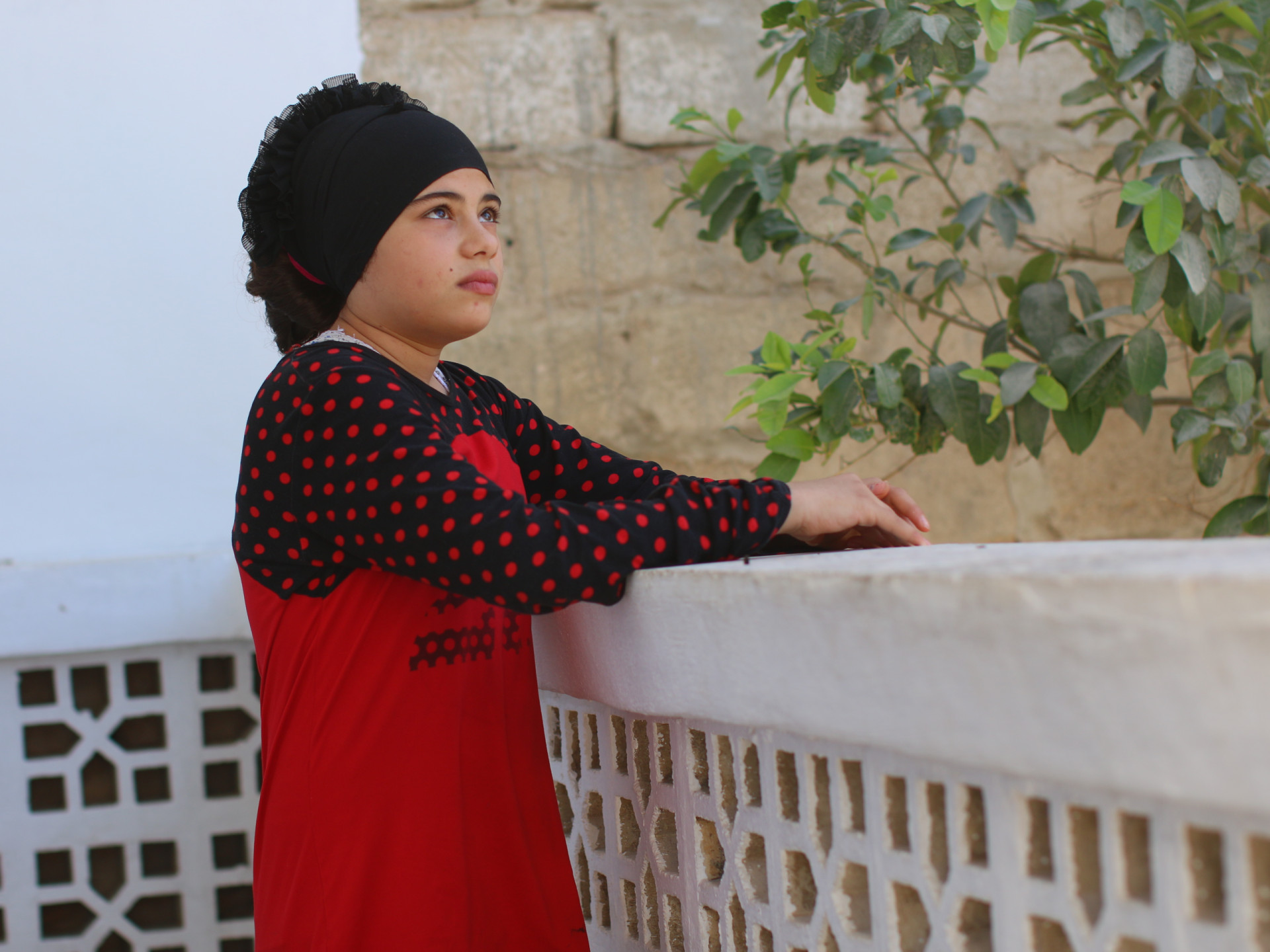 Buthaina is an orphan girl from Hama