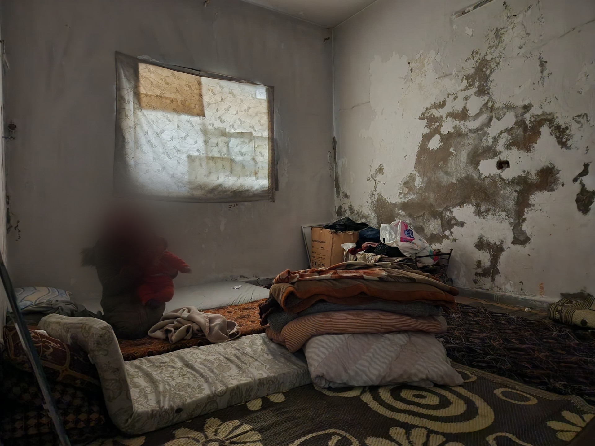 A decayed house and worn walls