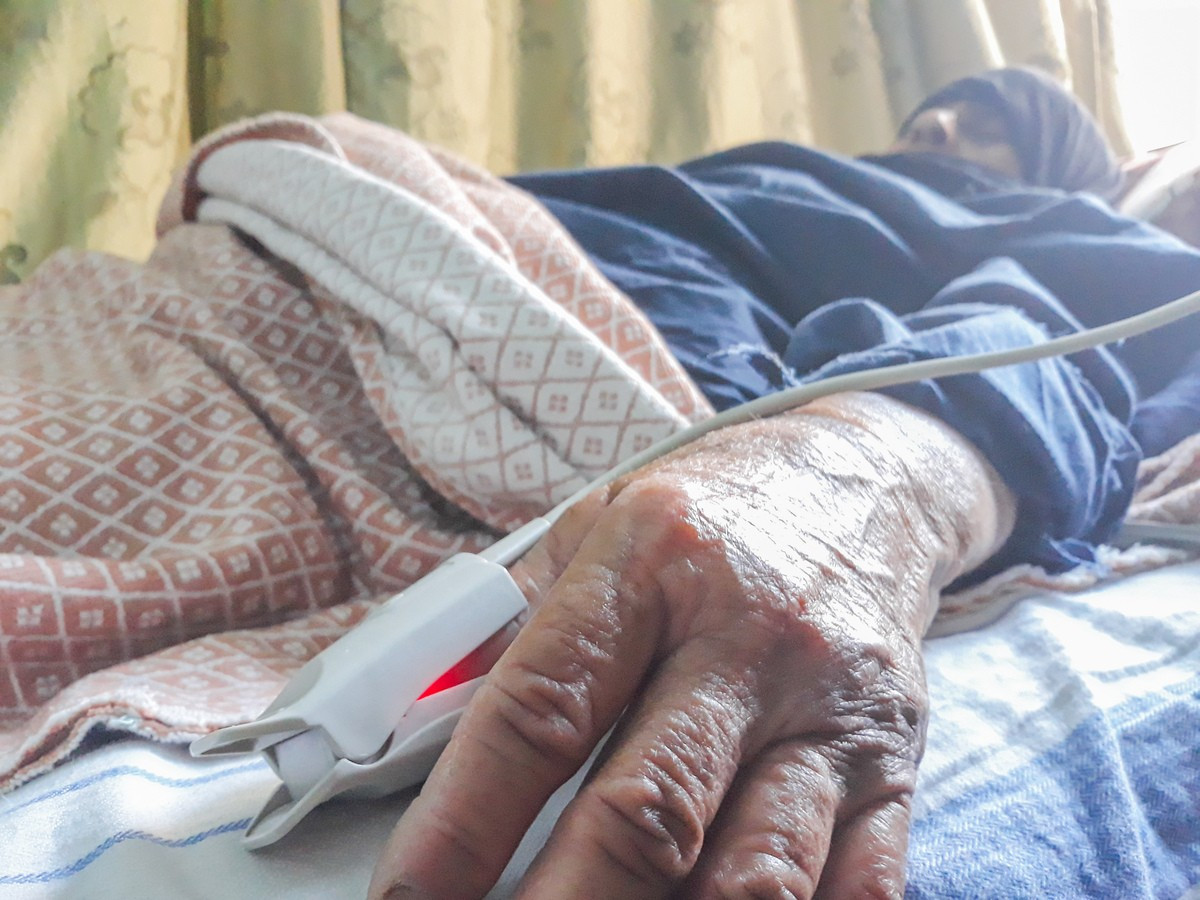 She is a displaced woman in need for urgent cardiac surgery
