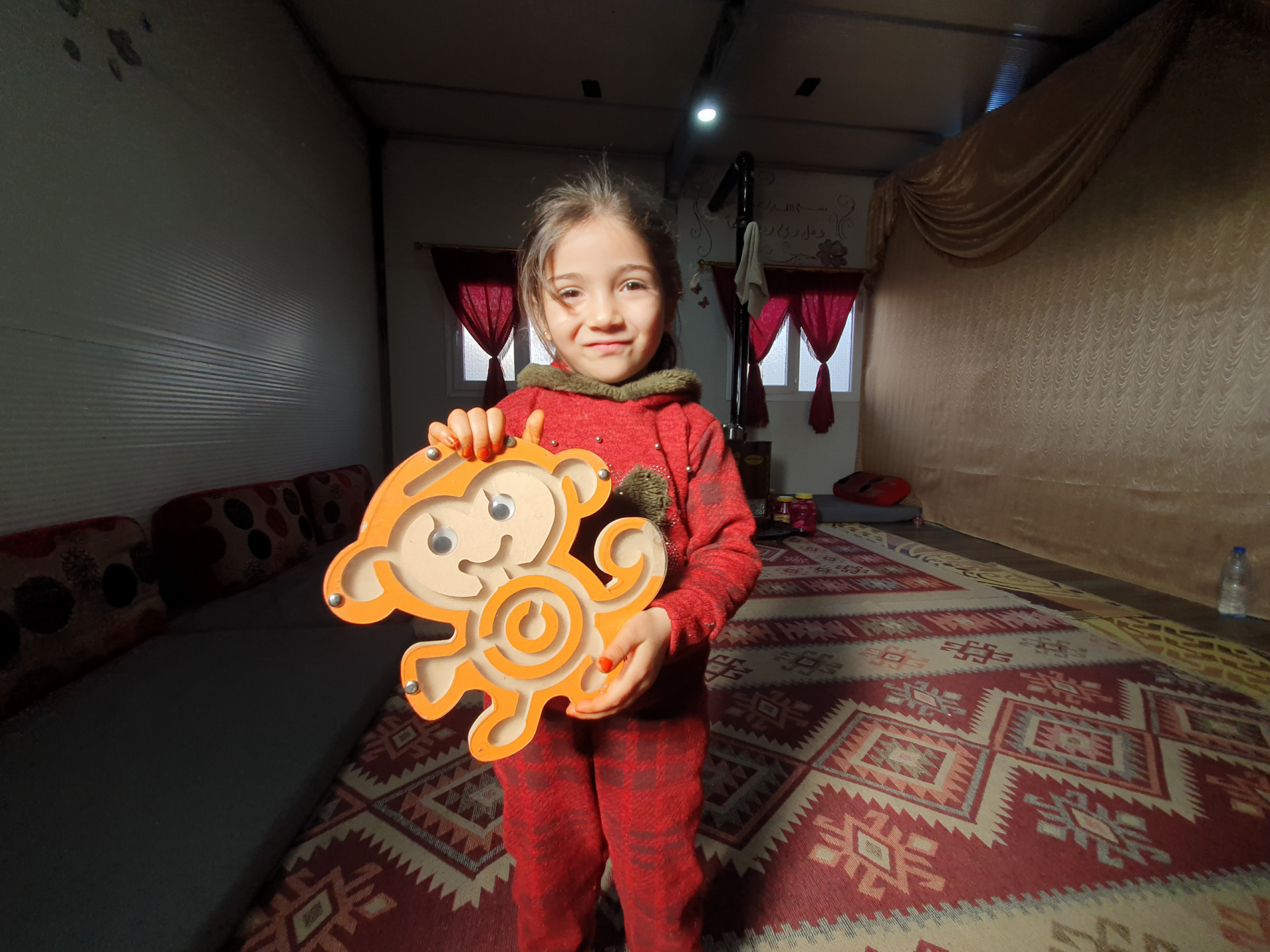 Ali's family suffers poverty, cold, and displacement.
