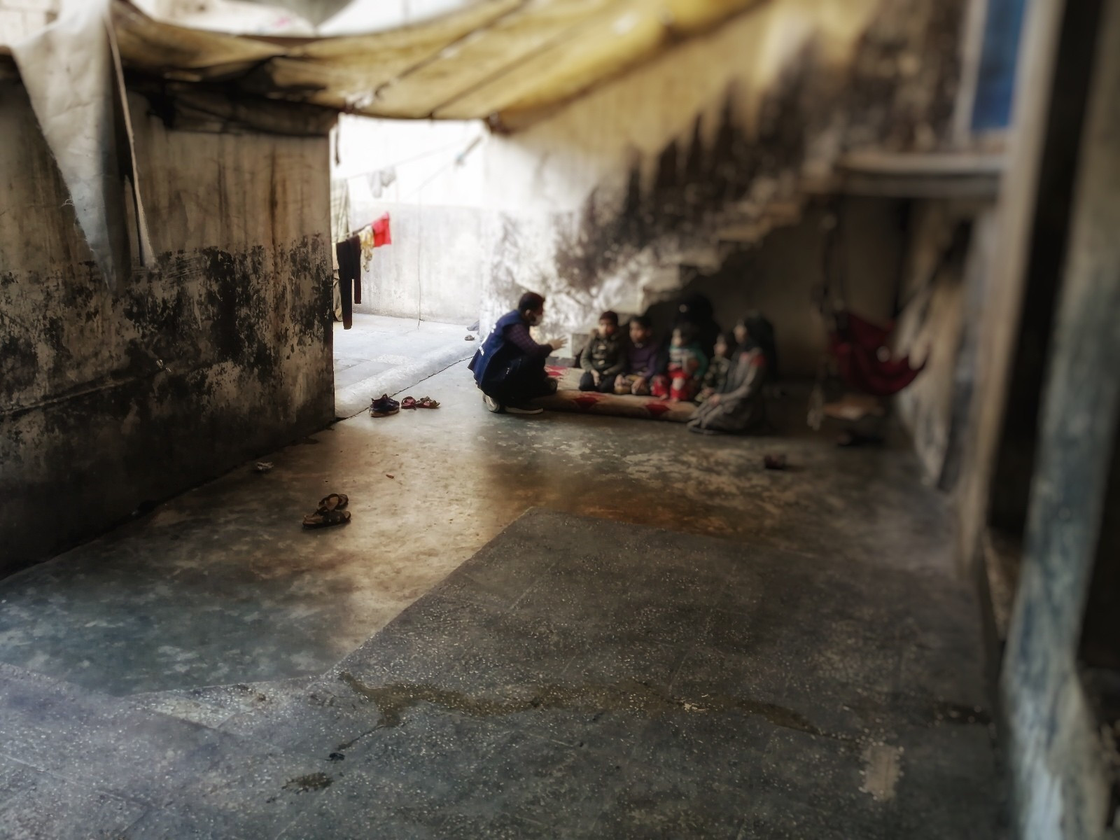 5 families live in one room