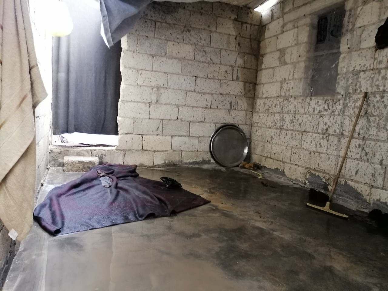 A family lives in a poor tent