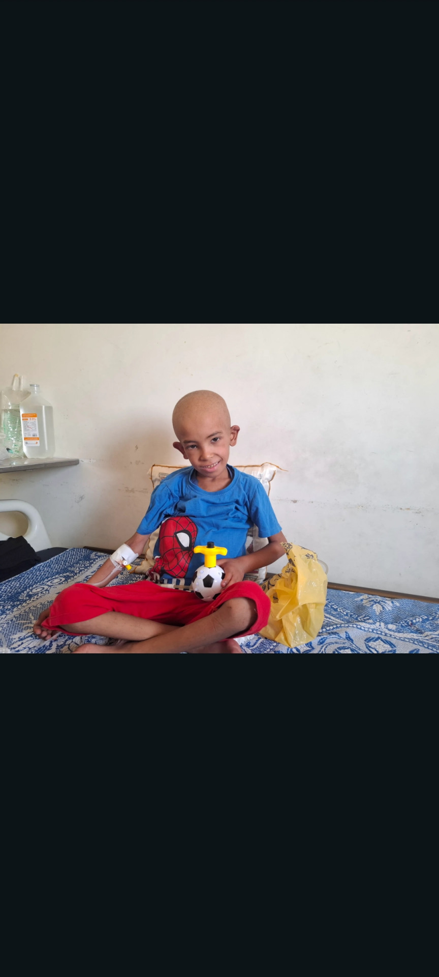 A little kid fighting cancer.