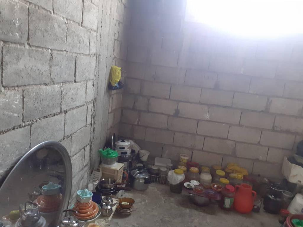 A displaced family lives in a poor house