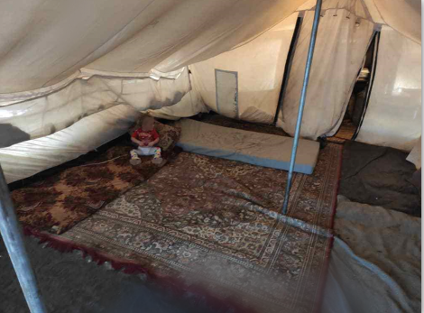 They live in a tent amidst the field