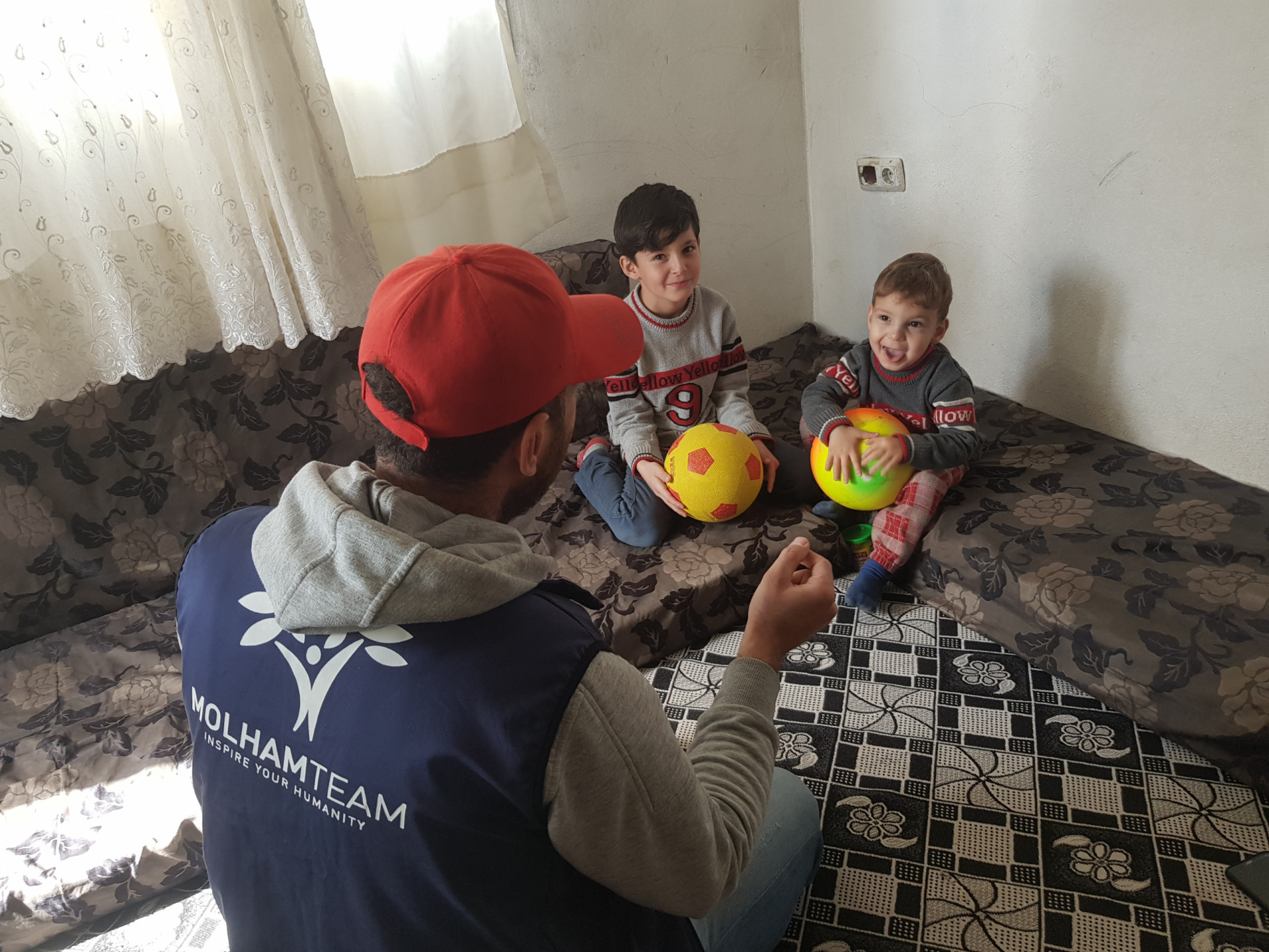 A mother and children who have no breadwinner and live under deplorable living conditions.