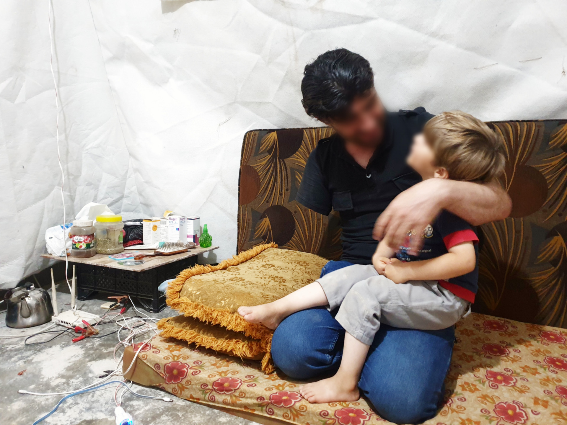 Ahmed has an amputated hand, vision impairment, and difficulties in speech.