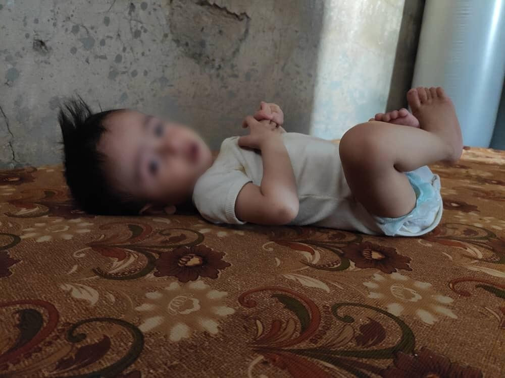 He is less than one year, suffers from hunger